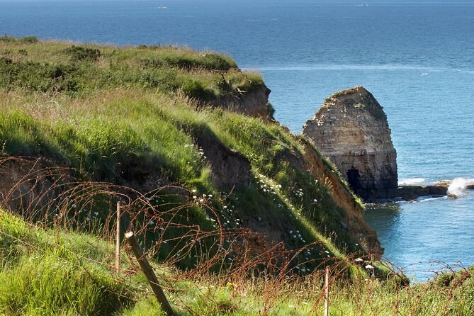 The cliff edge at Pointe du Hoc dropping to the Channel