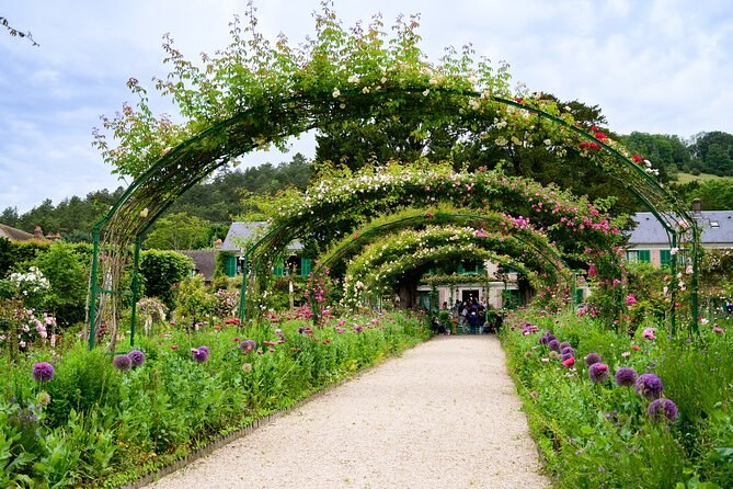 The long path under the flower arches in Monet's garden